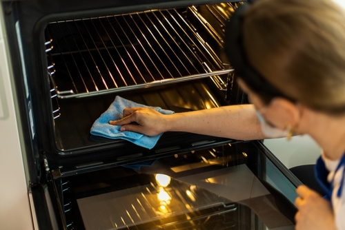 What is the best way to clean the inside of an oven