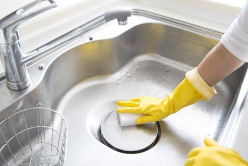 How do you sanitize a kitchen?