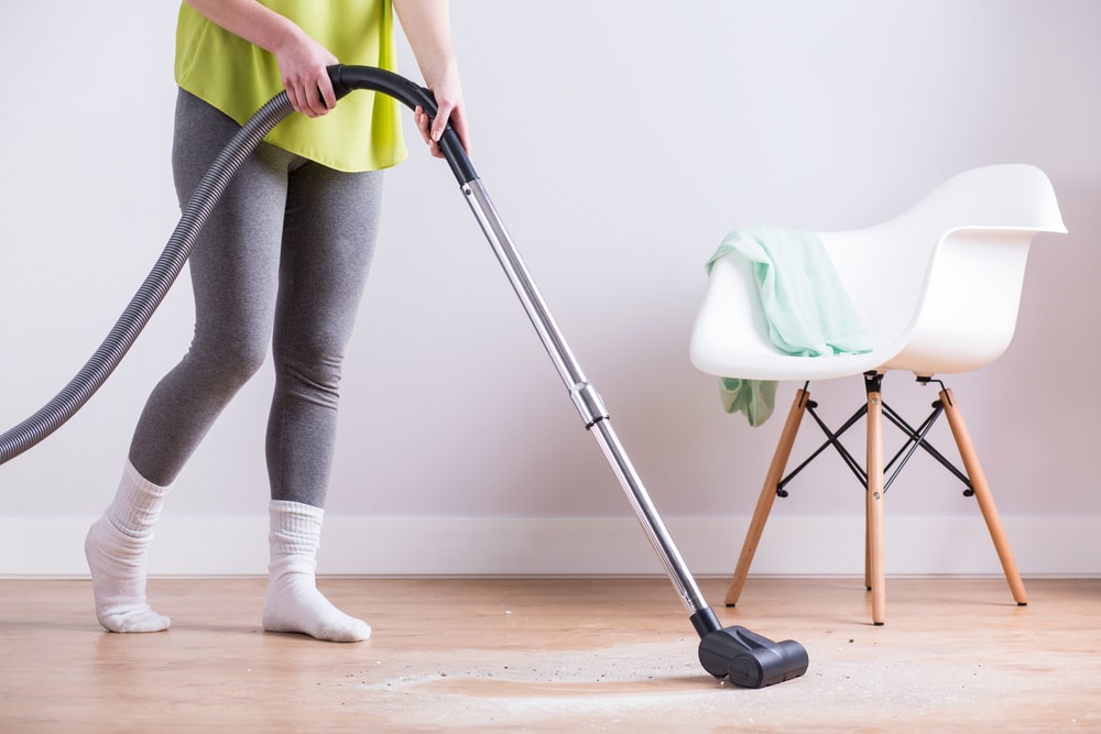Which areas need extra attention when outdoor dirt travels inside